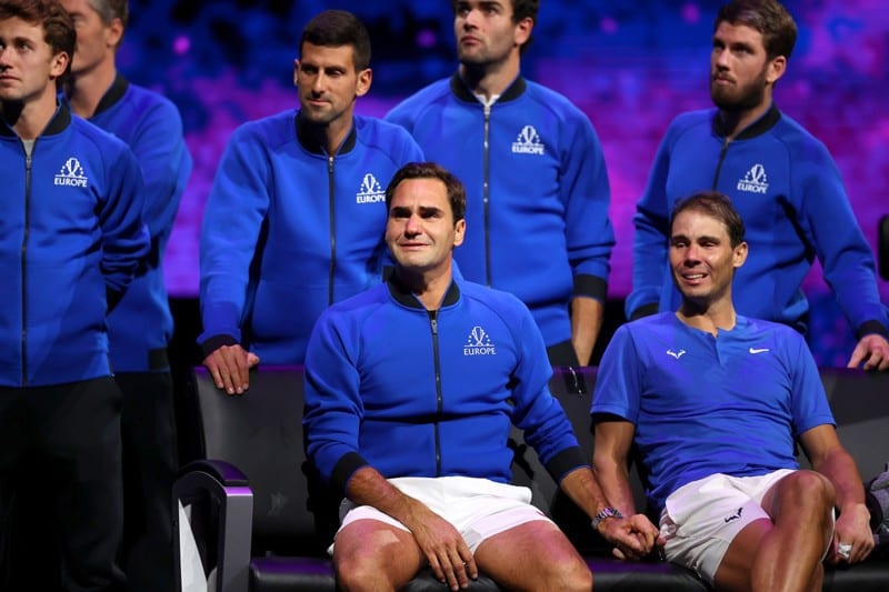 Roger Federer and Rafael Nadal in tears, holding hands at Federer’s farewell match